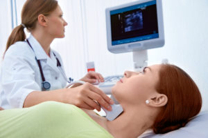 Palm Beach Ultrasound Woman getting thyroid screening